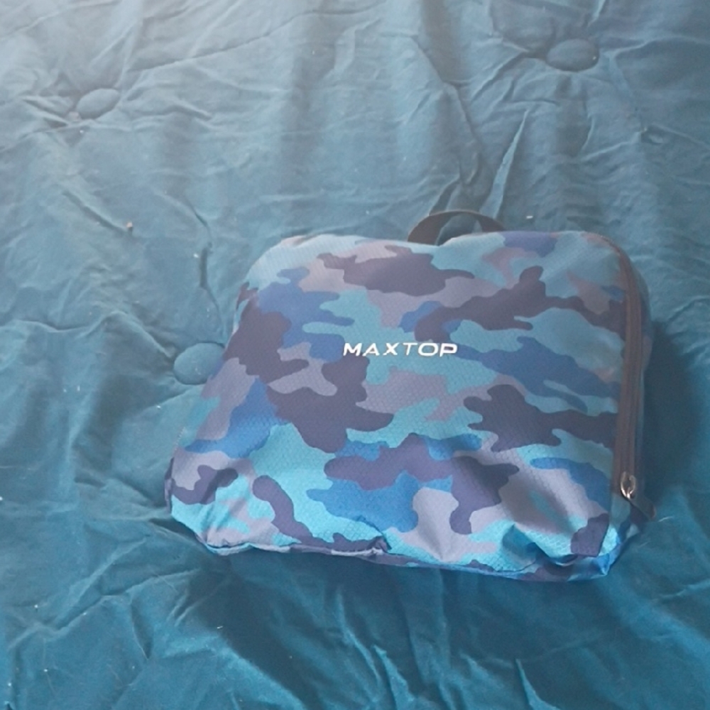 maxtop backpack that folds into its own storage pocket
